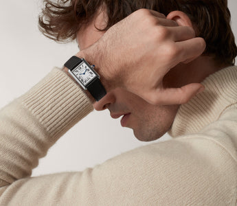 Cartier Tank Must on wrist with leather strap
