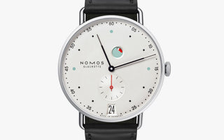 Nomos Metro Date Power Reserve ref. 1101 with white dial and red seconds hand