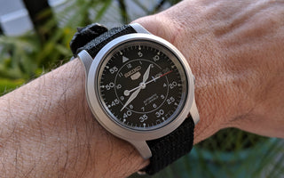 Seiko 5 SNK809 field watch with black dial