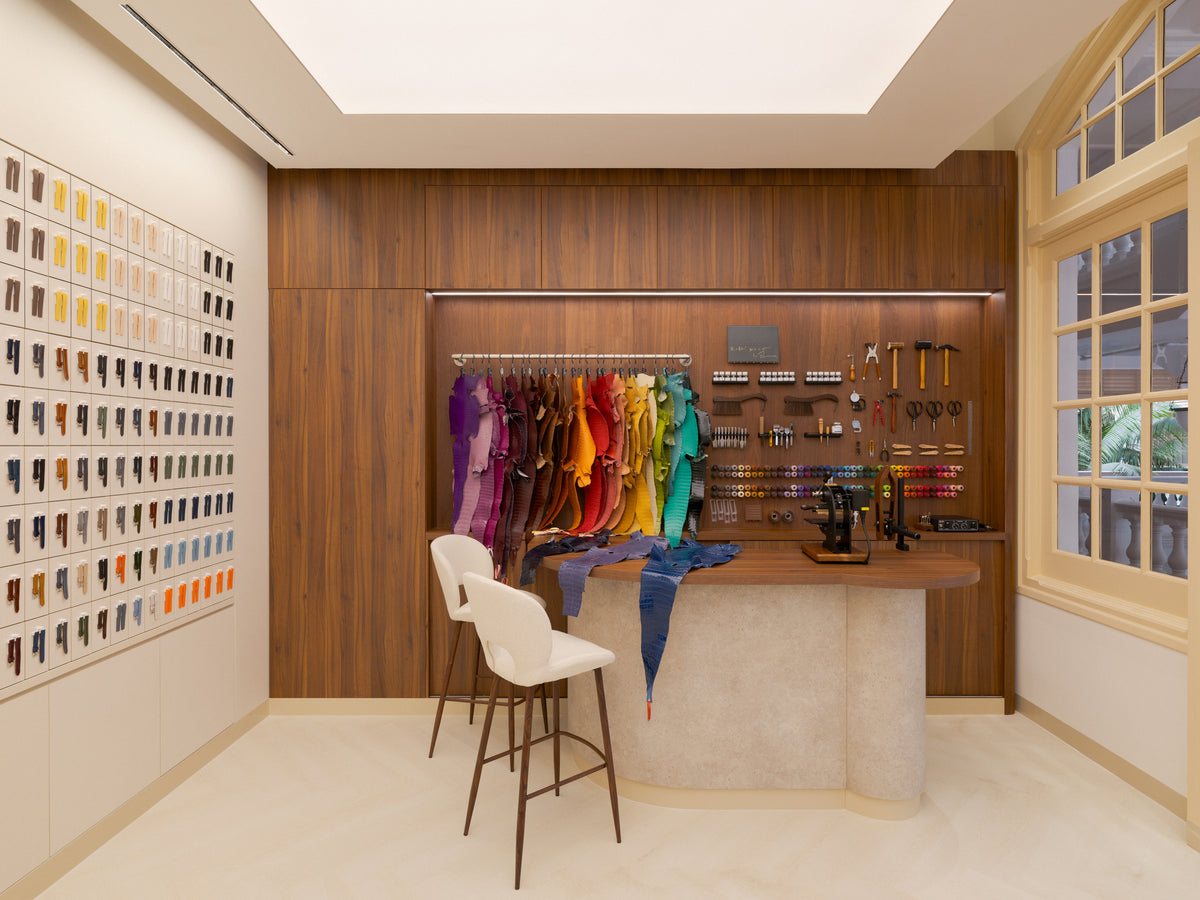 Leather hides and tools at the bespoke corner of the Delugs Flagship Boutique (Singapore).